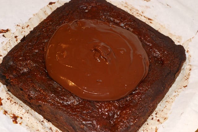 Icing puddle on warm brownies