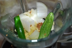 Onion, garlic, ginger, chili and fenugreek in blender jar