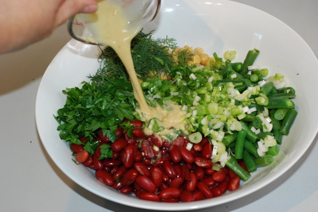 Pour the dressing over the salad