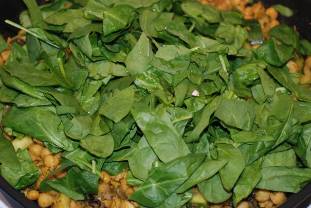 Add the chopped spinach to the pan