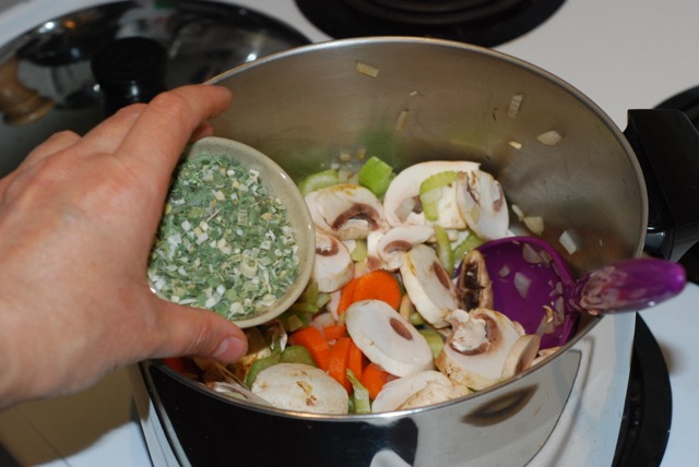 After sauteing the onions add the garlic, choped vegatbles and herbs