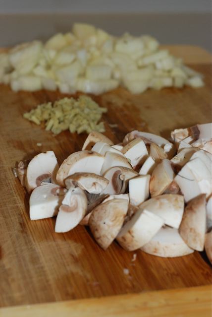 Diced onion, minced ginger, and sliced mushrooms