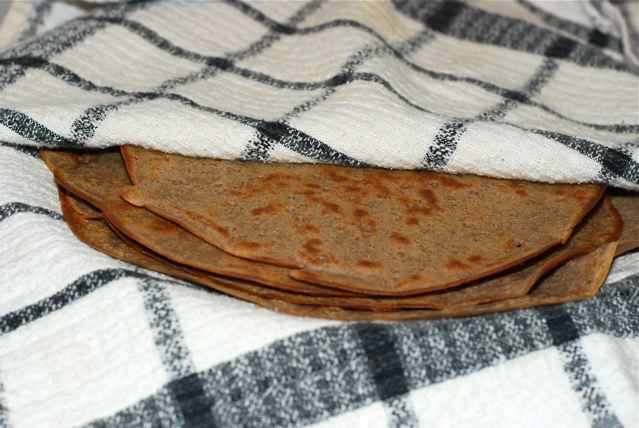 Close up finished crepes in kitchen towel