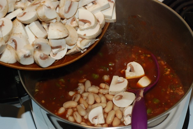 Add the mushrooms and white beans
