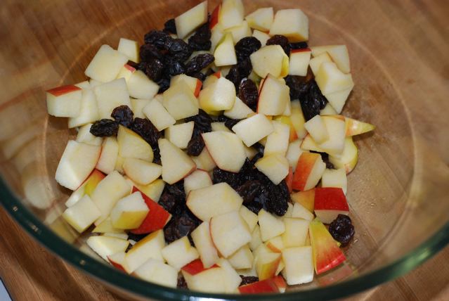 Chopped apples and raisins in a bowl