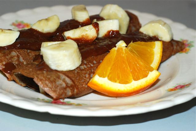 Buckwheat Crepes with Chocolate Orange Sauce served on a plate