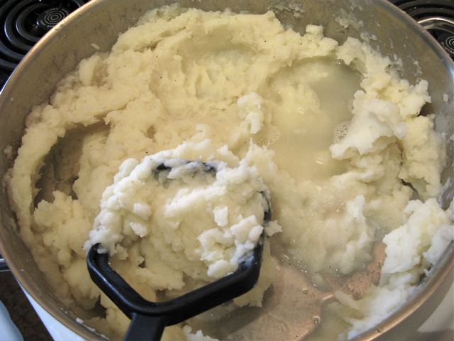 Add a bit of cooking water and mash again