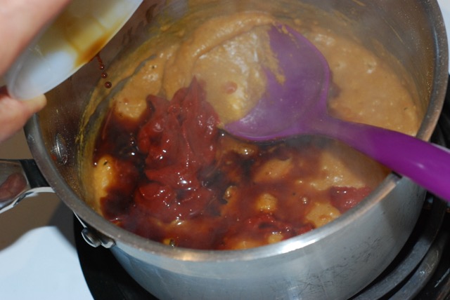 Add tomato paste and tamari
