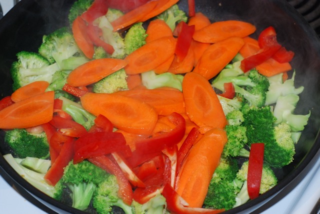 Add the carrots and red pepper