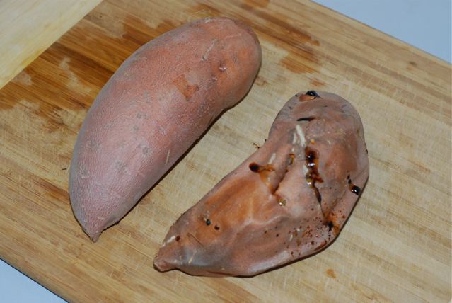 Raw and baked sweet potato on a cutting board