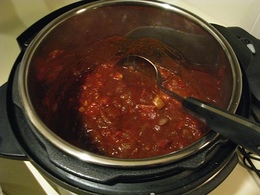 Add the diced tomatoes and the sauce and bring to a simmer