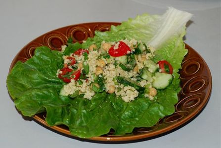 Millet tabouleh served on a lettuce leaf 2