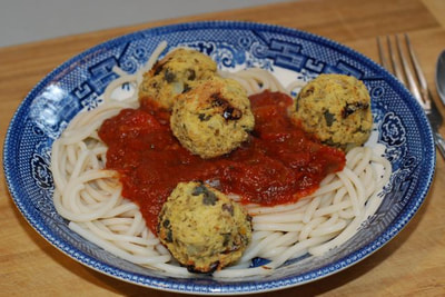 Millet and Lentil Balls served on pasta with Classic Italian Tomato Sauce. / Happy holidays from beansriceeverythingnice.weebly.com