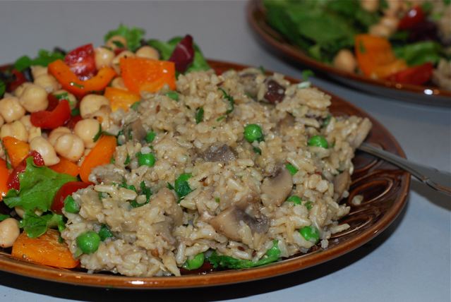 Masala Rice Pilaf with Mushrooms and Peas served on a plate