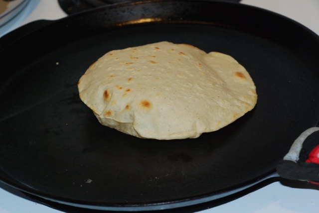 Cook the first side again for 90 seconds. It should puff up like this.
