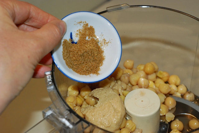 Adding ingredients to the food processor
