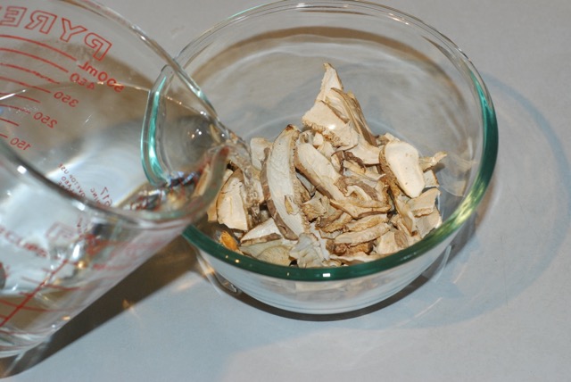 Soak the dried mushrooms in hot water