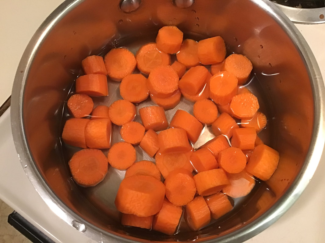 Cooking carrots slices--Carrot hummus / Gluten-Free, Oil-Free, Vegan--beansriceeverythingnIce.weebly.com