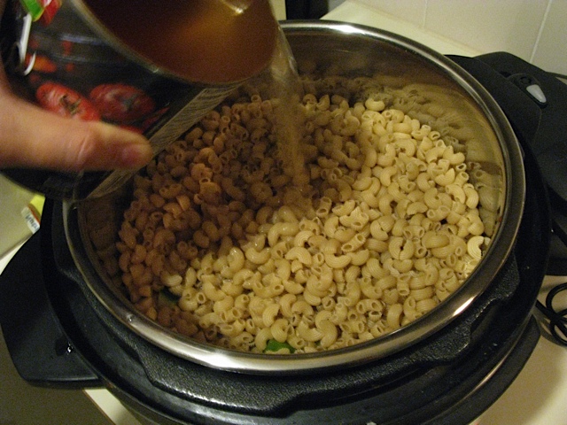 Add the macaroni and water