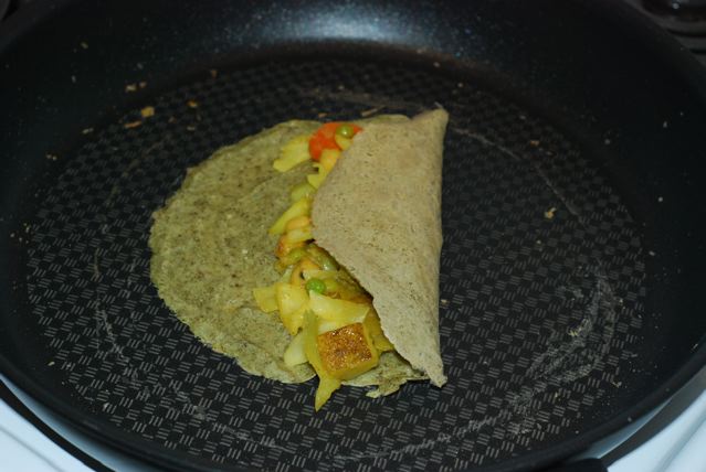Mung Bean Crepes filled with Spiced Cabbage and Peas with Potatoes