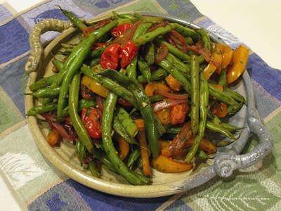 Green Beans with Lemon and Herbes de Provence on a serving dish ready for your holiday meal. / Happy Holidays from beansriceeverythingnice.weebly.com