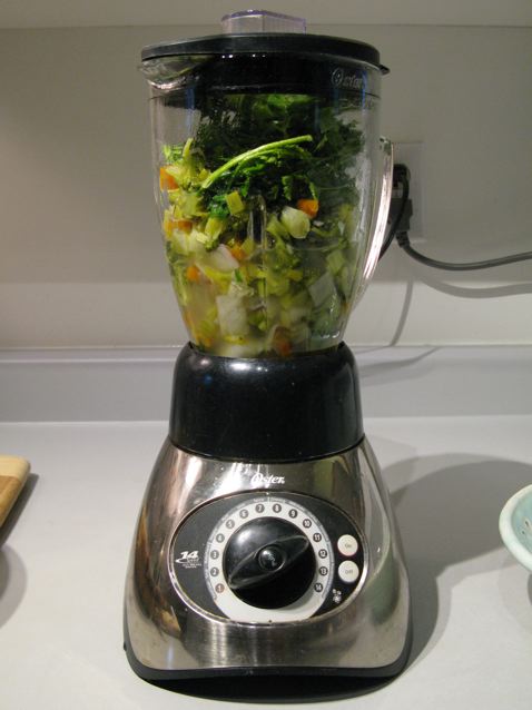 Blend half the solids with 1 cup of cooking liquid and a handful of parsley