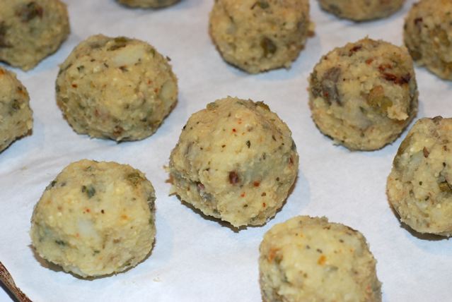 Baking tray of uncooked millet balls