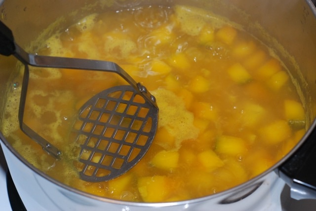Coarsely mash the cooked soup with a potato masher