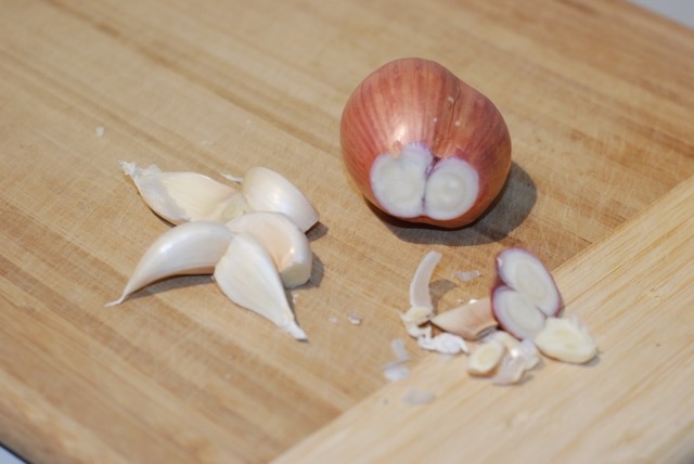 Trimmed shallot and garlic