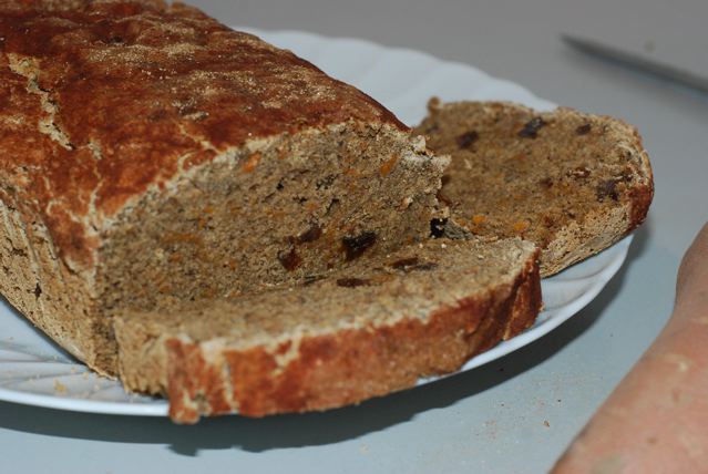 Sweet Potato Quick Bread sliced open to show the texture