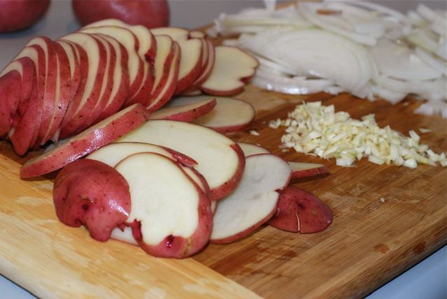 Sliced onions, potatoes, and coarsly chopped garlic