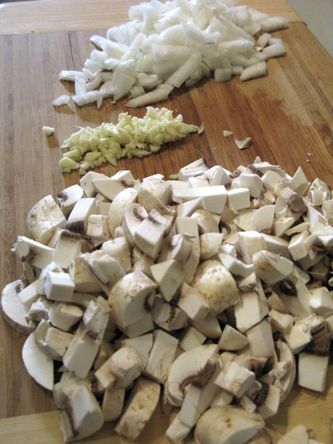 Diced onion, minced garlic, and diced mushrooms
