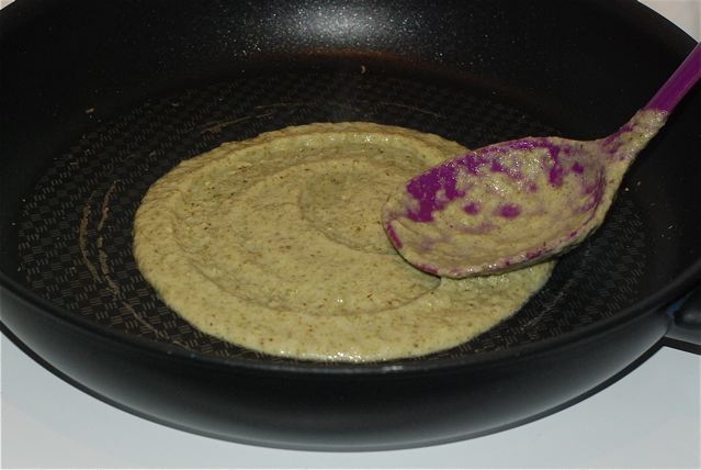 Spread the mung bean crepe batter with the back of a spoon