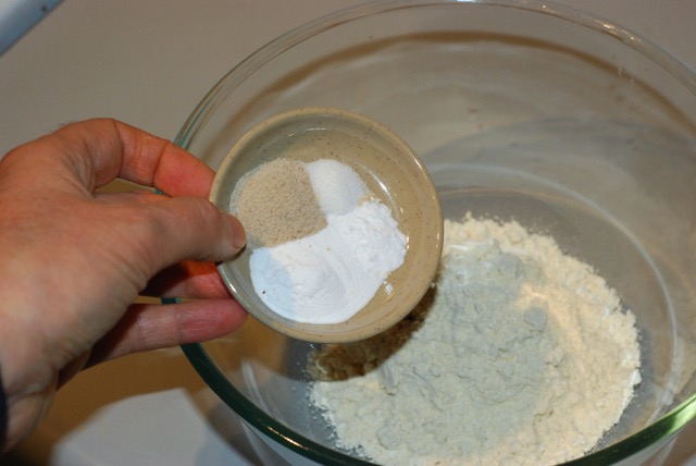 Add the baking powder, soda, salt, and psyllium to the flour