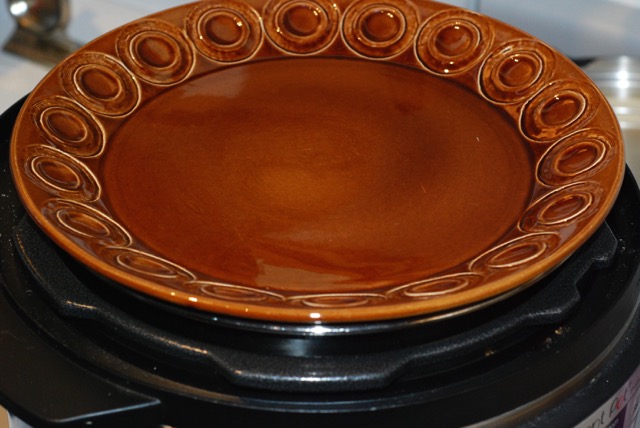 Cover with a plate or a lid