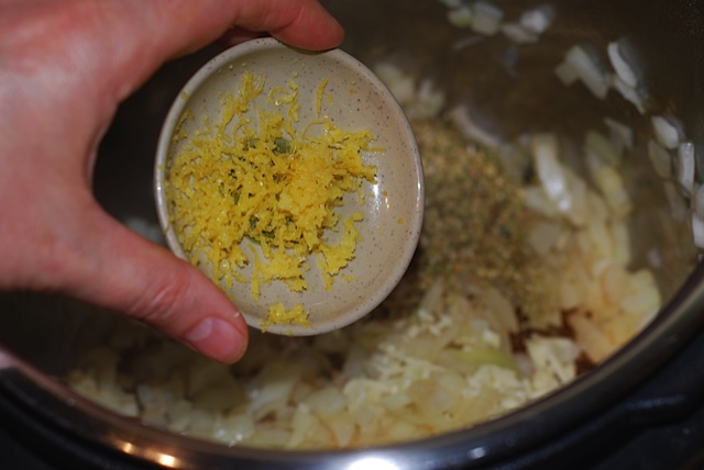 Once the onions are cooked, add the garlic, oregano and lemon zest