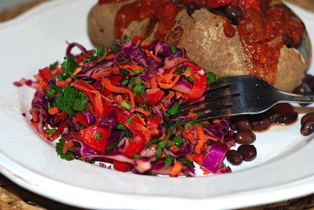 Jewel Coloured Red Cabbage Slaw stabbed with a fork