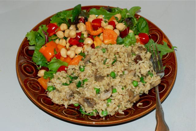Masala Rice Pilaf with Mushrooms and Peas served with a simple salad 