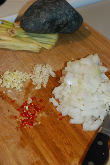 Chopped onion, galangal, garlic, chili, and bruised lemongrass