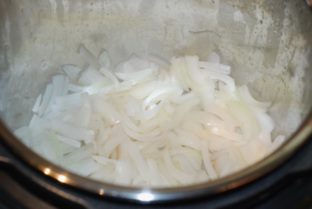 Spread the onions evenly over the bottom of the pan