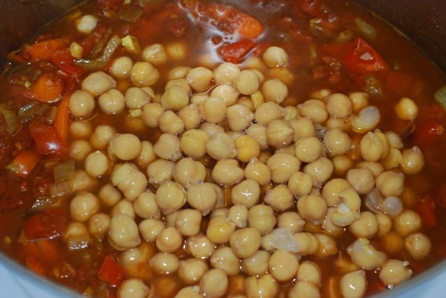 Water and chickpeas added to the tomatoes