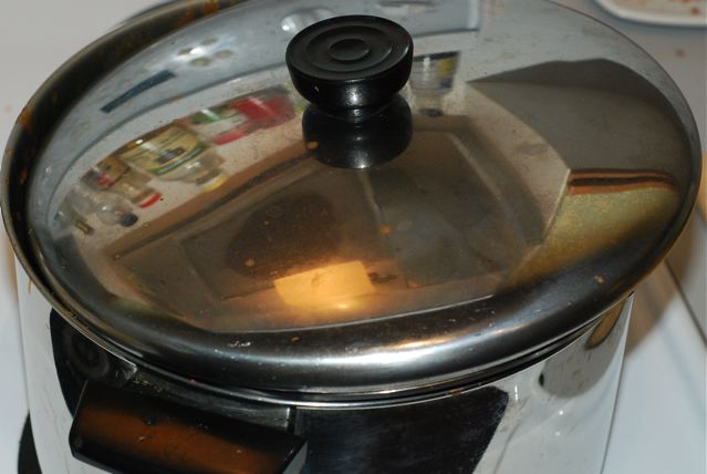 Cover the pot with a lid slightly ajar