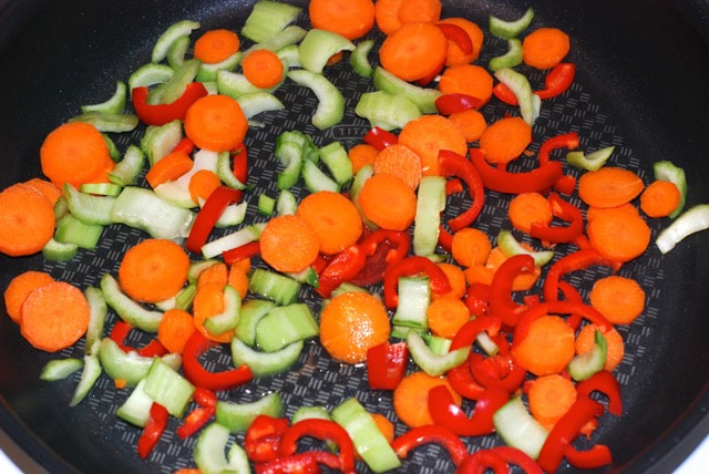 Cook carrots, peppers, bok choi stems