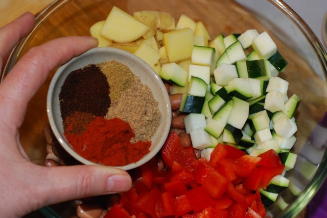 Add the herbs and spices to the mixing bowl