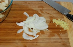 Sliced onions and chopped ginger