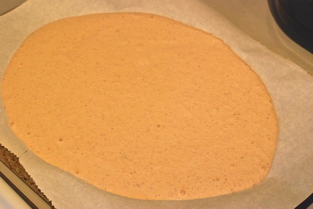 Pour the batter onto a parchment-lined baking sheet