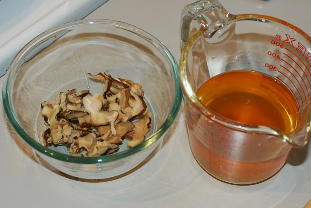 Drain and squeeze the dried mushrooms