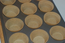 Muffin tray with parchment paper liners