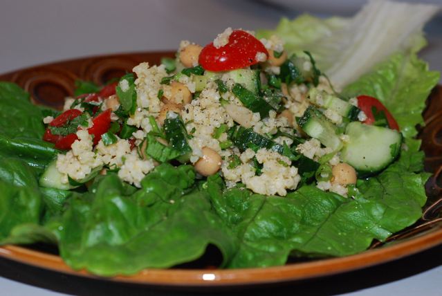 Millet Tabouleh served on a lettuce leaf