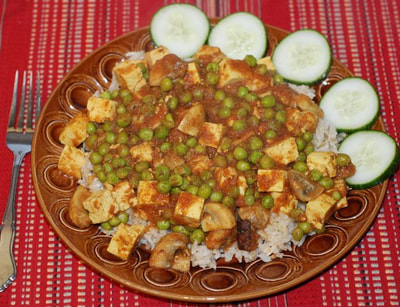 Lunch of Mushroom and Pea Masala with Tofu Paneer with cucumber slices on the side--beansriceeverythingnice@weebly.com
